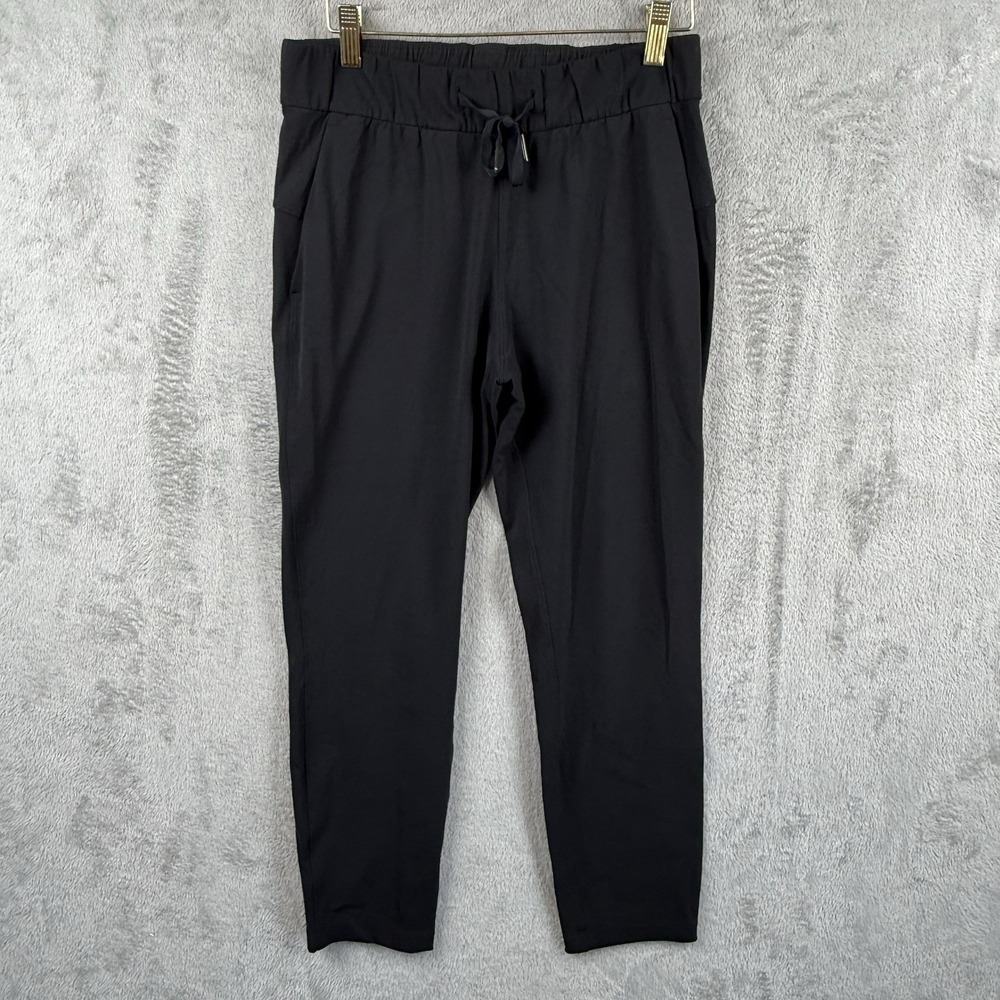 Lululemon On The Fly Pant Womens 4 Black Drawstring Stretch Athleisure Tapered